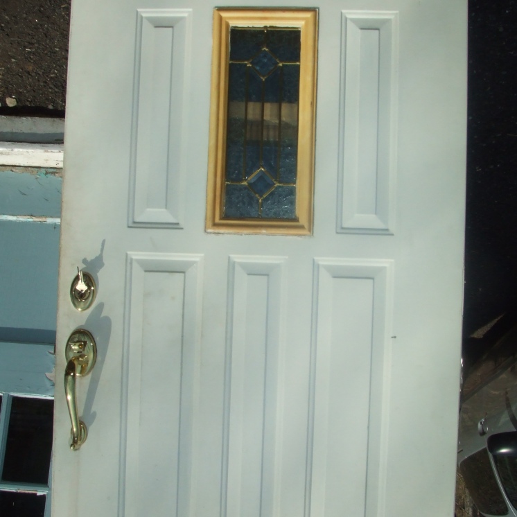 Exterior metal door with leaded window - 36 x 80 Baldwin and Schlage hardware, kick plate $400
